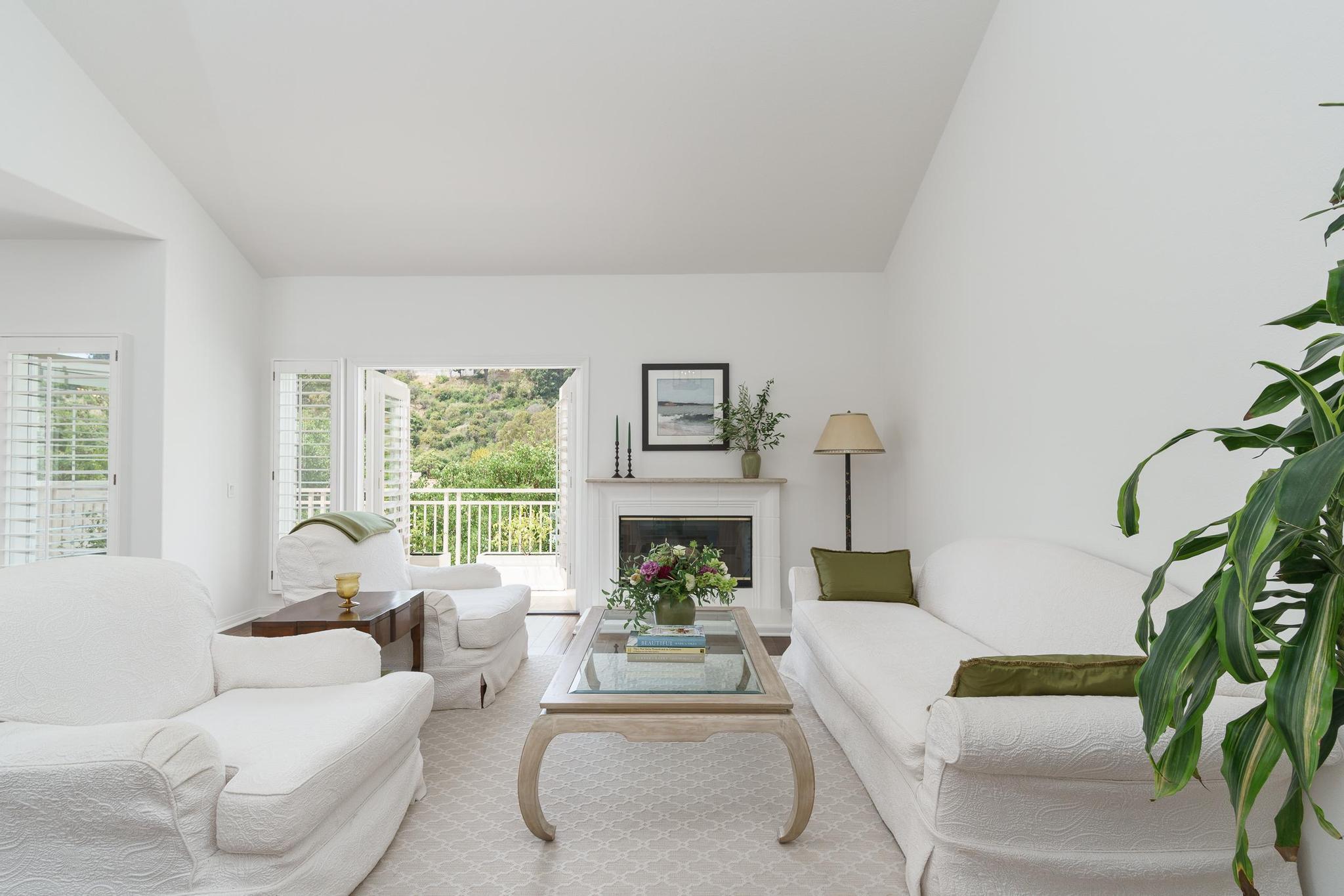 Pacific Palisades living room after renovation with modern furniture and updated finishes