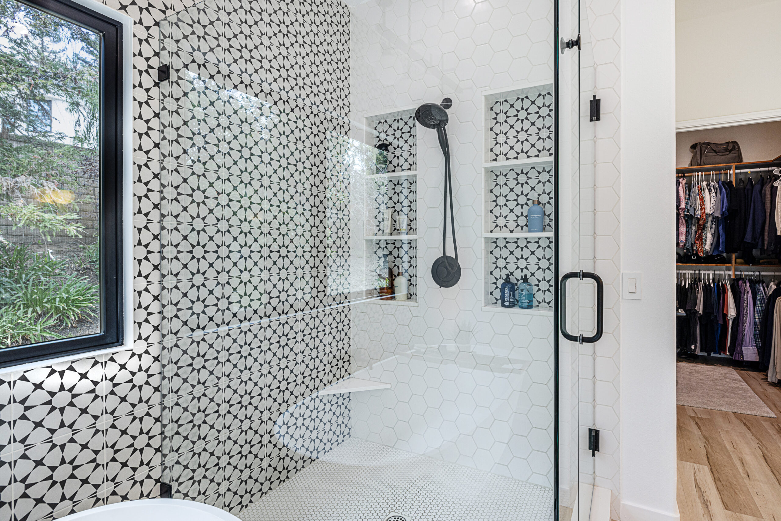 Moody entryway with dramatic lighting and elegant finishes at Denver Springs