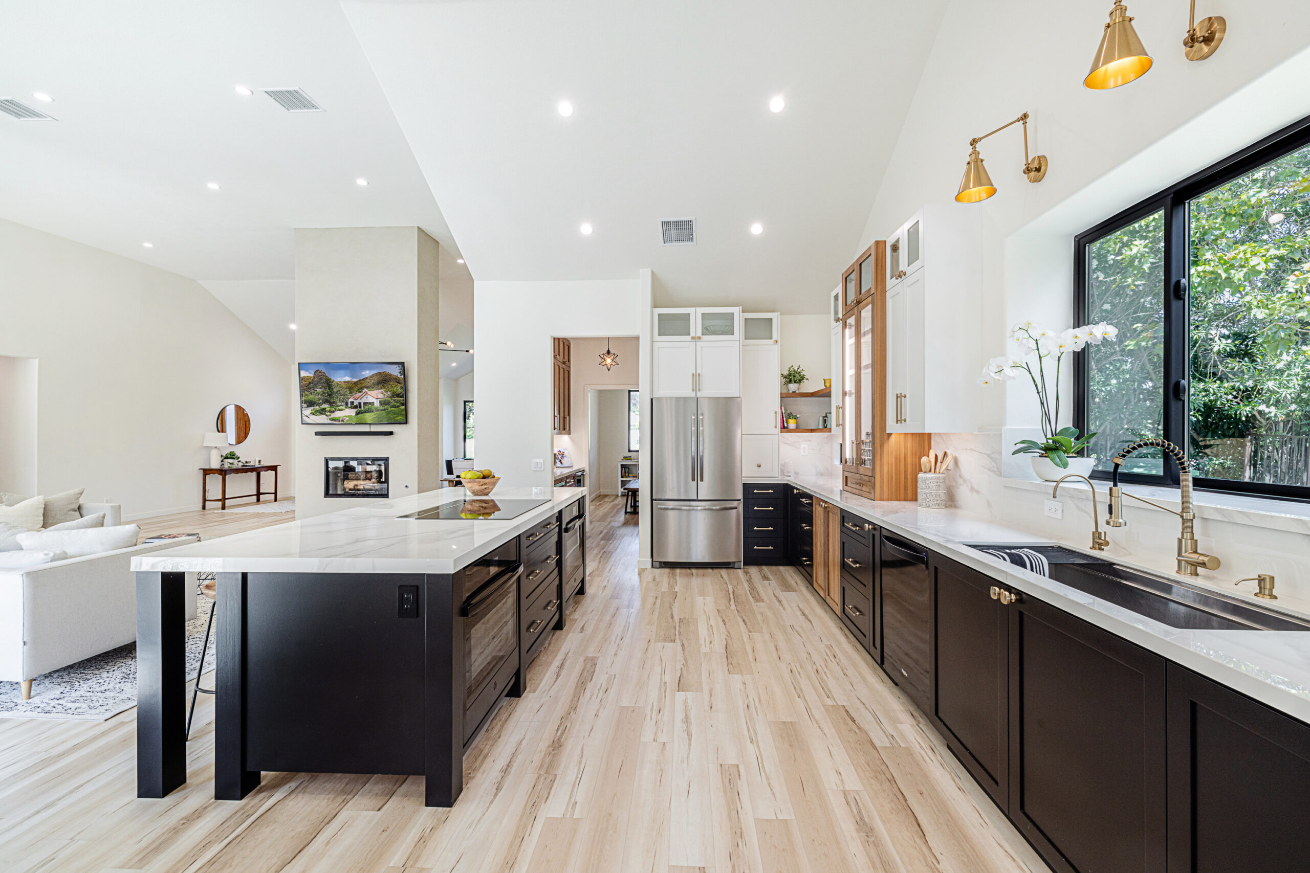 Modern kitchen island with pendant lighting at Denver Springs